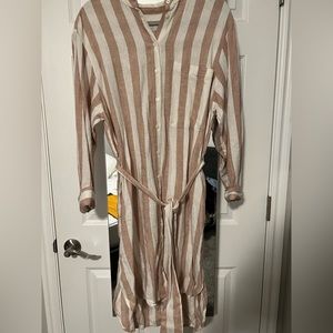 Tan and white stripped dress. Button down the front with a tie